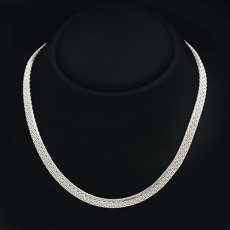 An 18K white gold chain, Unoaerre, Italy, 27g.