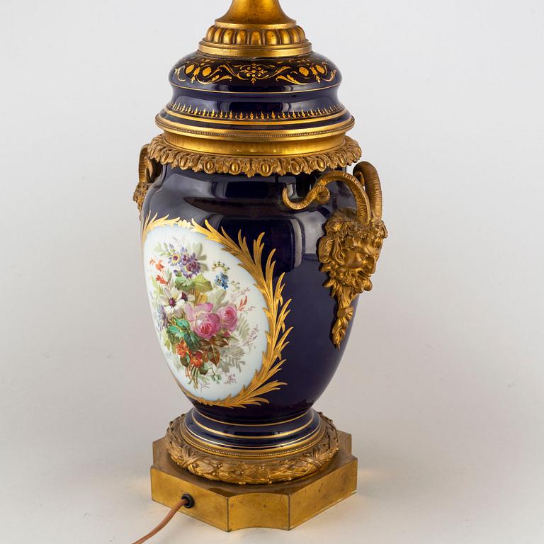 A French bronze mounted porcelain table lamp, late 19th Century, signed Thuilier.