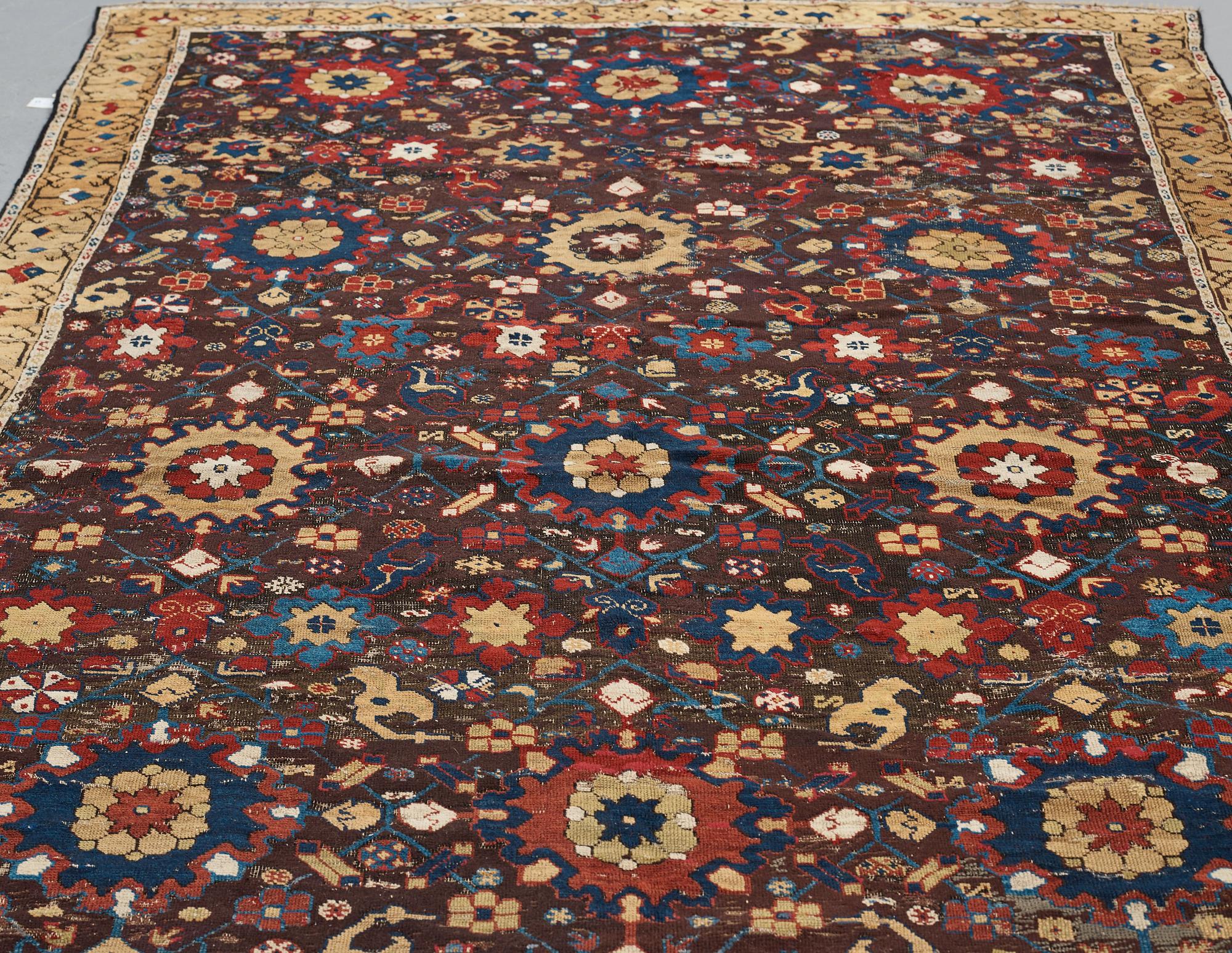 A carpet, fragment, an antique Karabagh 18th century, ca 293-300,5 x 202,5-205,5 cm.