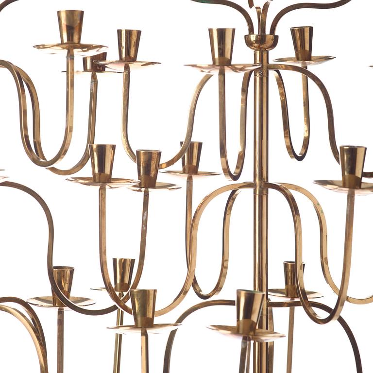 Svenskt Tenn, a pair of Swedish Modern brass candelabra, 1940-50's, probably designed by Josef  Frank.