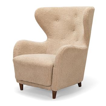 A mid-20th Century arm chair.