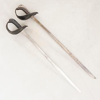 Two Swedish practice swords, 1886 pattern.