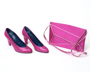 An evening bag and a pair of lady shoes by Charles Jourdan.