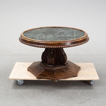 A oak and stone coffee table, first half of the 20th century.