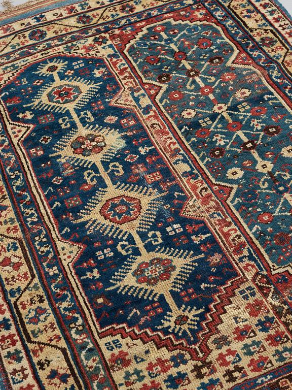 A RUG. An antique Anatolian, probably Megri. 185,5 x 137 cm (as well as one end with six cm flat weave).