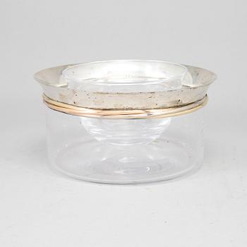 LES MUST DE CARTIER, a sterling silver and glass caviar bowl, Paris, France.
