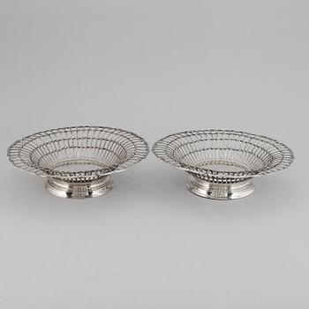 A pair of Swedish early 20th century silver baskets, mark of CG Hallberg, Stockholm 1912.