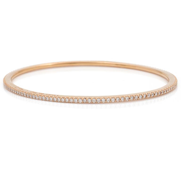 A brilliant cut diamond "Love bracelet" bangle by Ole Lynggard.