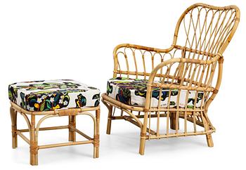 531. A Josef Frank ratten easy chair and stool, Svenskt Tenn, model 311.