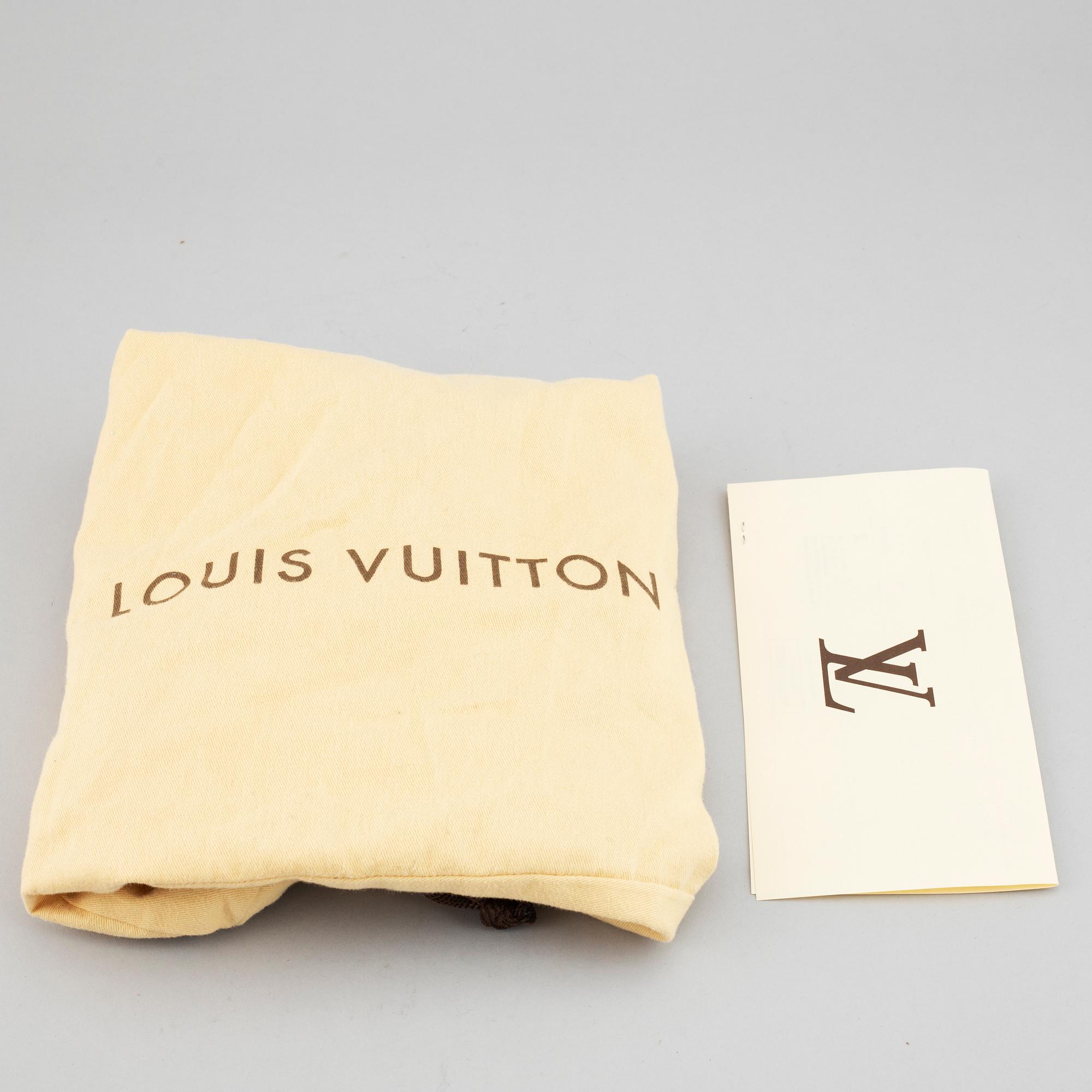 LOUIS VUITTON, an "Odek PM" handbag.