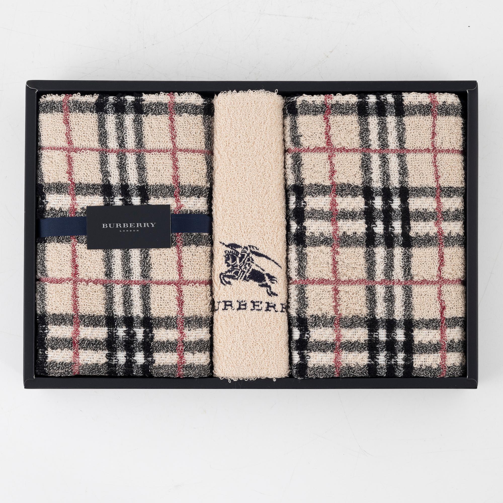 Burberry, a set of three towels.