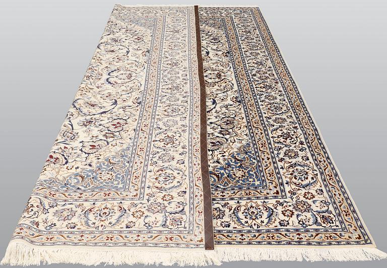 A carpet, Nain part silk so called 9LAA, ca 375 x 244 cm.