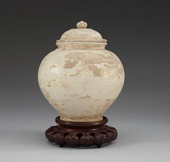 A cream glazed potted jar, Tang dynasty (618-907 AD.).