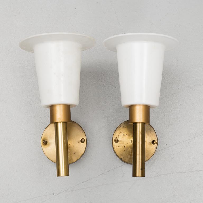 UNO & ÖSTEN KRISTIANSSON, a pair of brass wall light from Luxus.