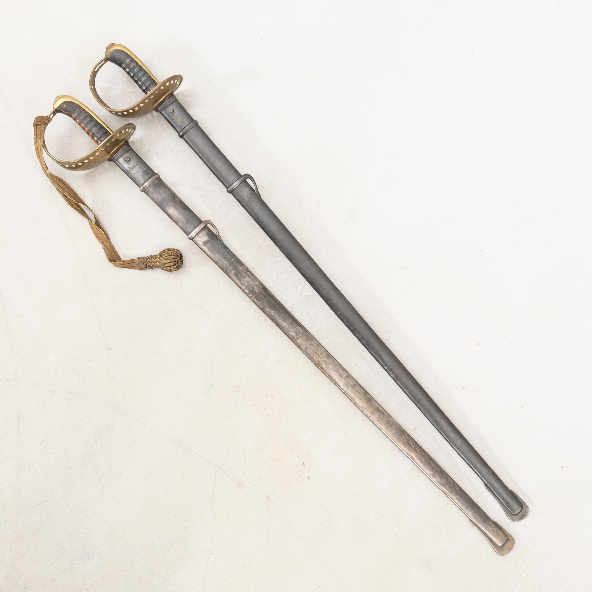 Two Swedish sabres, 1893 cavalry pattern, with scabbards.