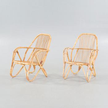 A pair of lounge chairs from the latter half of the 20th century.