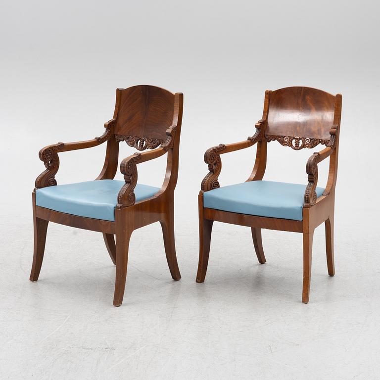 A pair of Baltic late Empire mahogany open armchairs, ca 1840.
