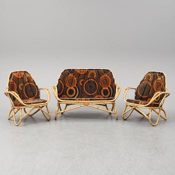 A sofa and two easy chairs, 1960s.