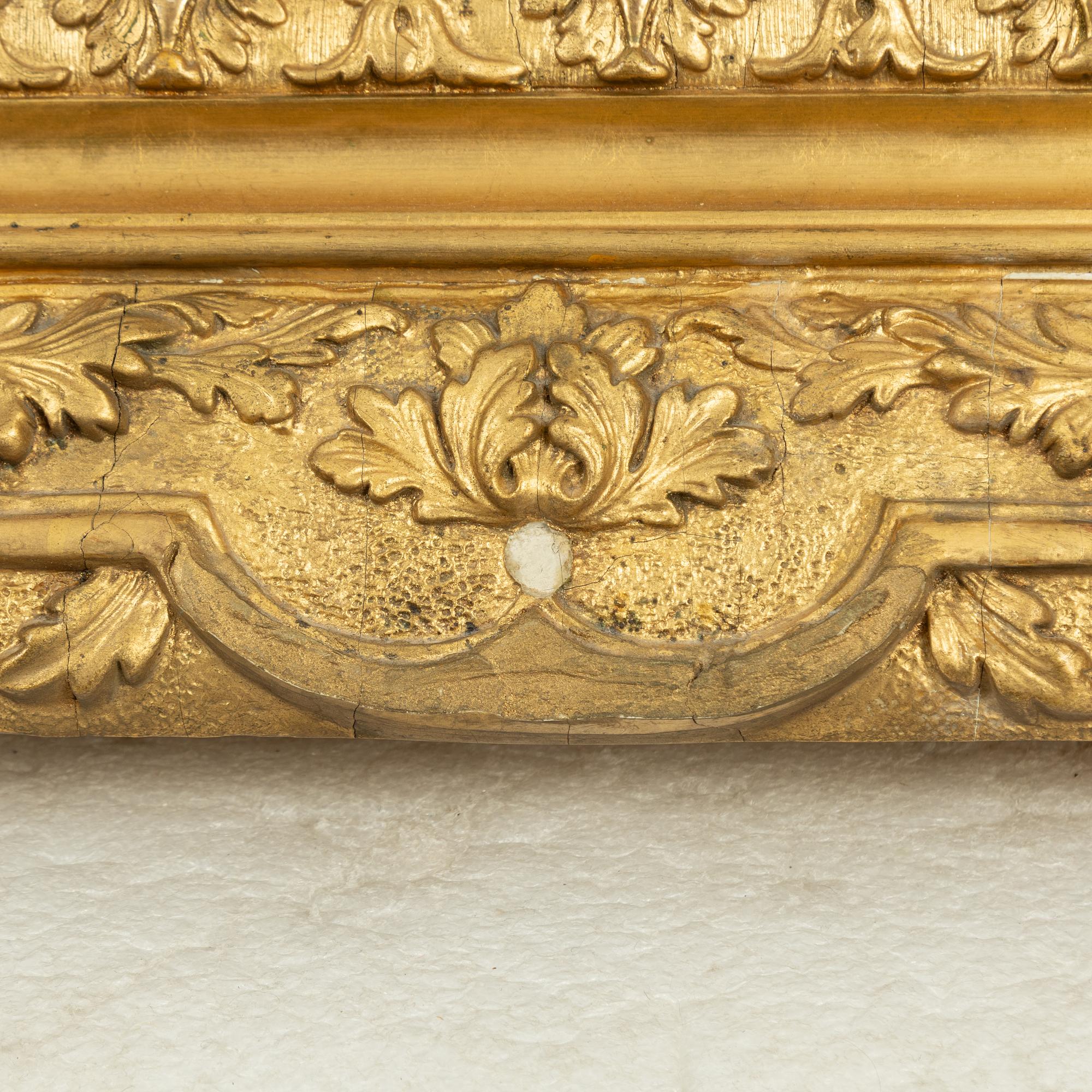 A picture frame, early 20th century, converted into a mirror.