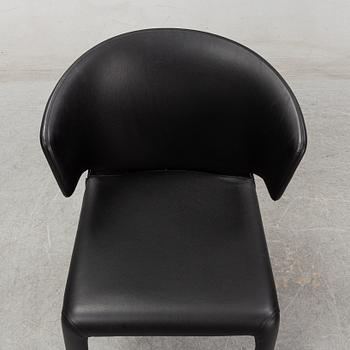 A set of five Hannes Wettstein 'Hola' black leather chairs, model 367, Cassina, Italy.