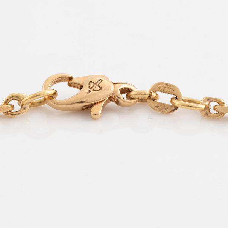 Hängsmycke, i form av leopard, 18K guld med, rubiner, smaragder och briljantslipade diamanter, med kedja.