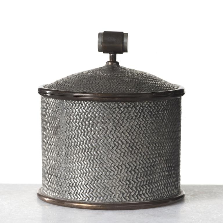 Estrid Ericson, a pewter and brass jar with cover by Svenskt Tenn, Stockholm 1936.