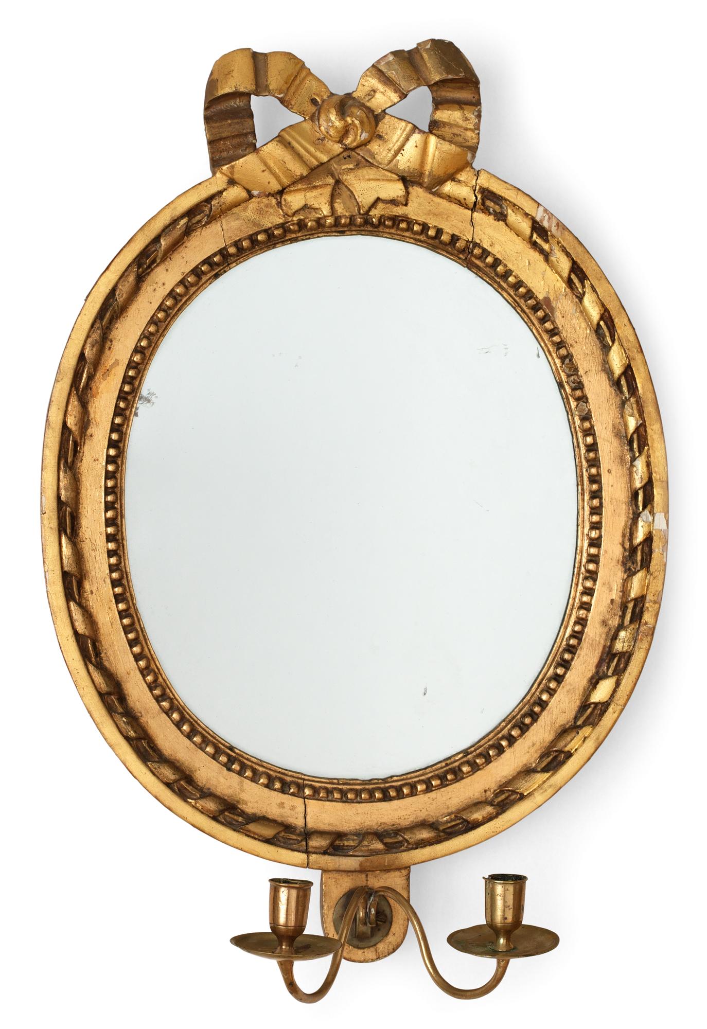 A pair of Gustavian two-light girandole mirrors by E. Wahlberg.