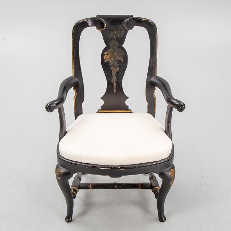 A rococo style armchair, around 1900.