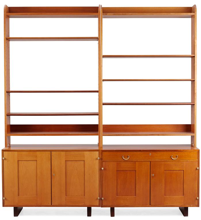 Two sections of Josef Frank mahogany bookshelves, Svenskt Tenn, model 2112.