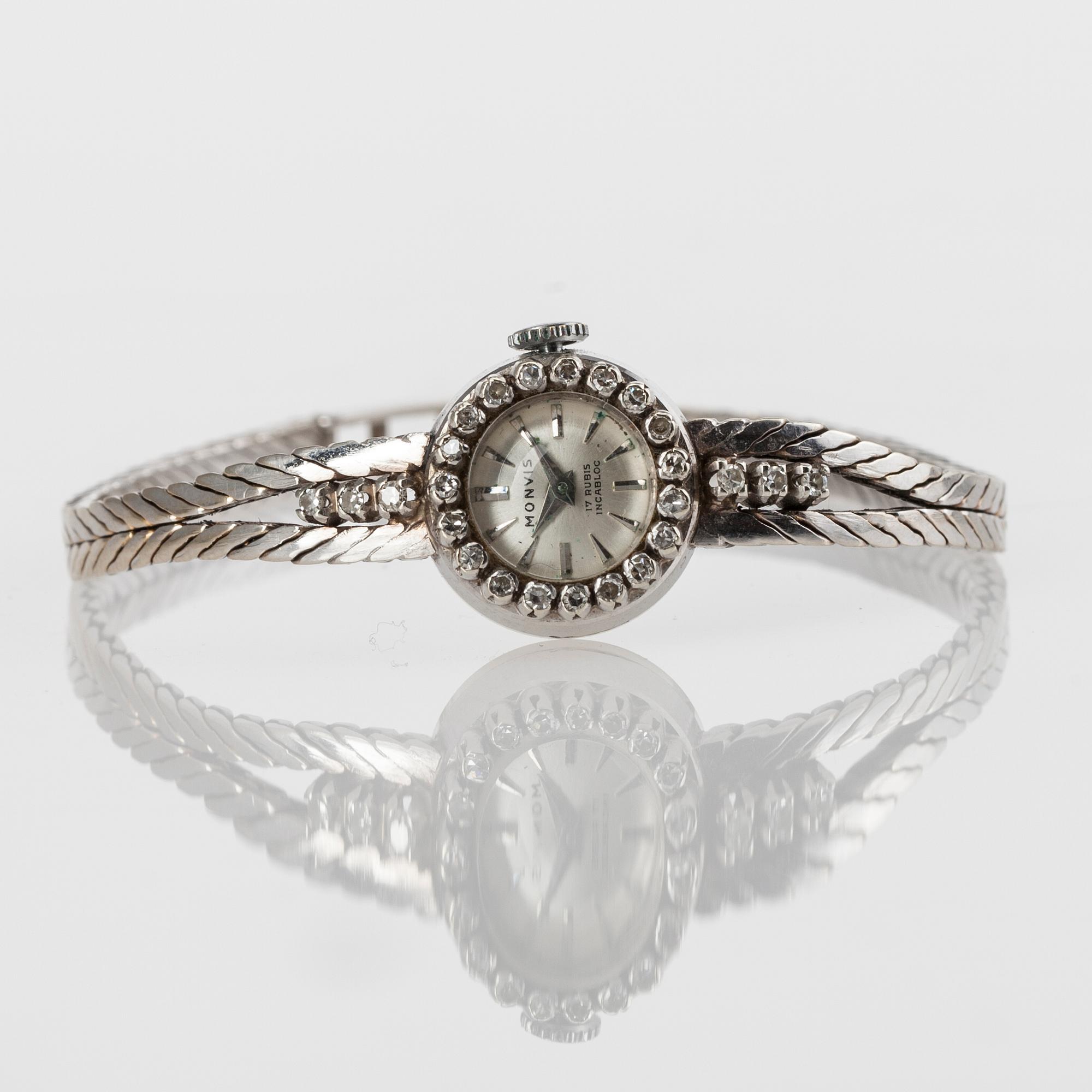 DAMARMBANDSUR, Monvis, 18K guld, 25 åttkantslipade diamanter, 1900-talets andra hälft. Vikt 20 g.