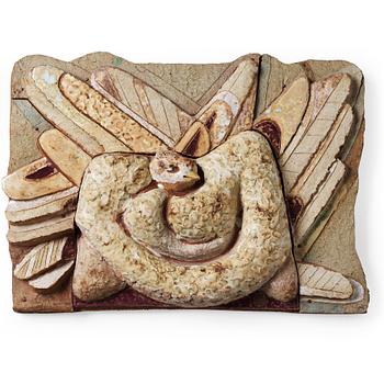 Tyra Lundgren, a stoneware relief 'Reclining pecock dove', Sweden circa 1960.