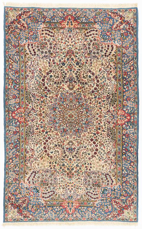 A rug, Kerman, ca 230 x 145 cm.