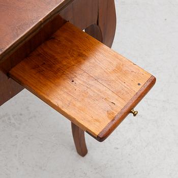 A Rococo game table, 18th century.