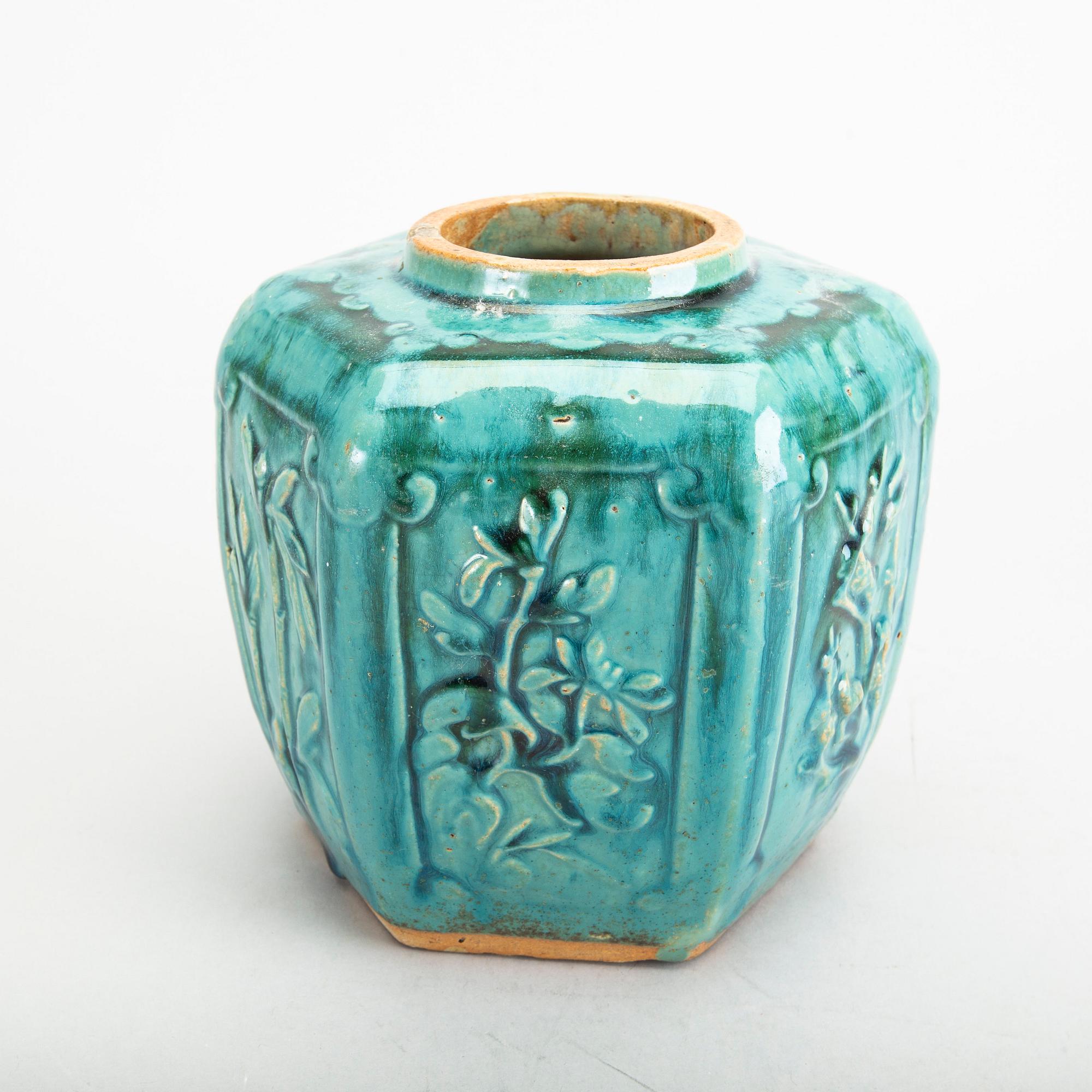 A Chinese 19th century stoneware urn.