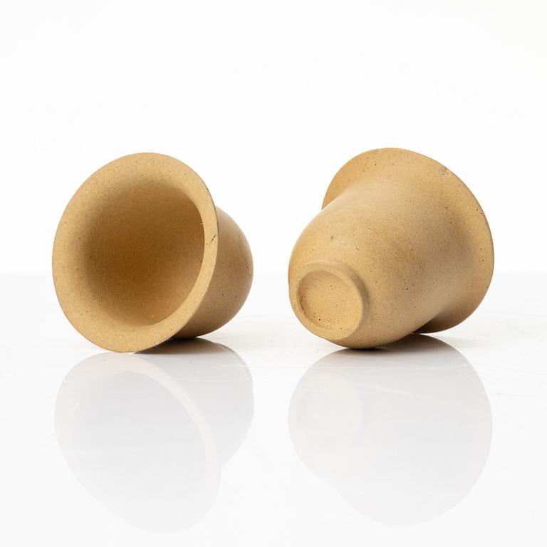 A set of a yellow yixing 'gongfu' teapot and four cups, China, 1980s.