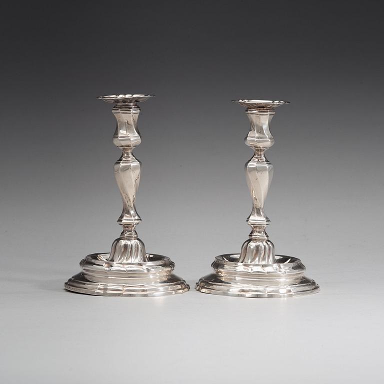 A pair of Swedish mid 18th century silver candlesticks, marks of Petter Åkerman, Stockholm 1756.