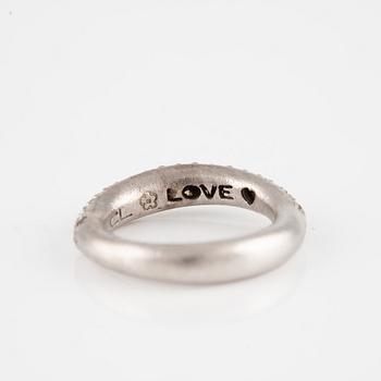 Ole Lynggaard two "Love" rings no. 4 in 18K white gold with round brilliant-cut diamonds.