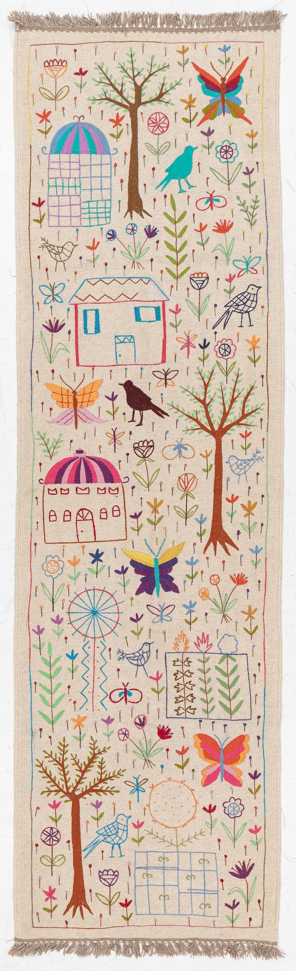 A hand-embroidered Kelim runner, c. 292 x 85 cm.
