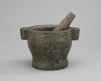 207. A marble mortar with pestle.