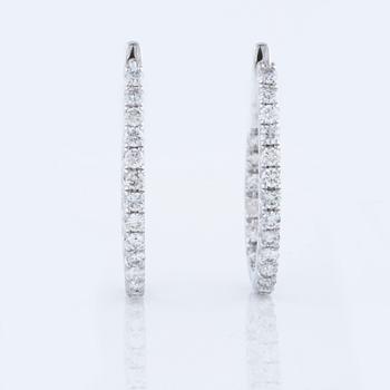 A pair of ca 1.90 cts brilliant cut diamond earrings.