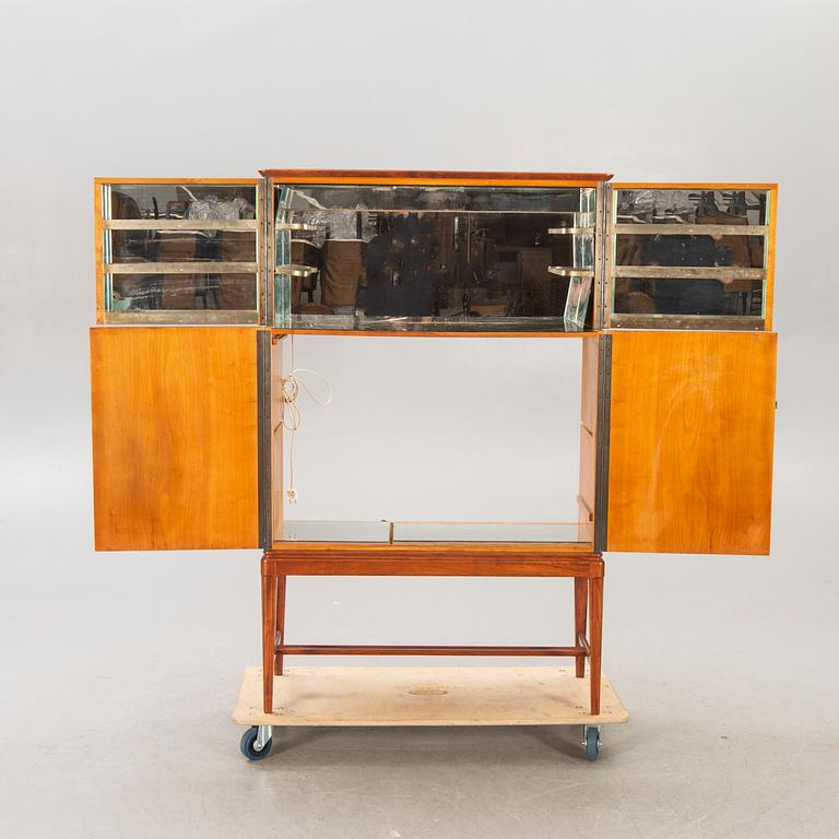 A Swedish Modern 1950s mahogany bar cabinet.