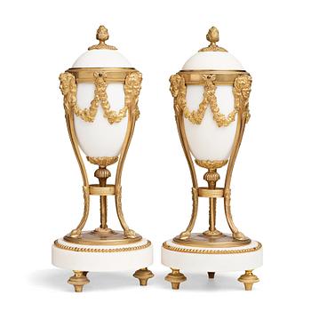 A pair of Louis XVI-style candlesticks, circa 1900.