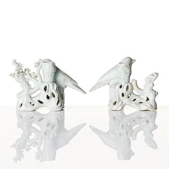 A pair of blanc de chine candle/joss stick holders, Qing dynasty.