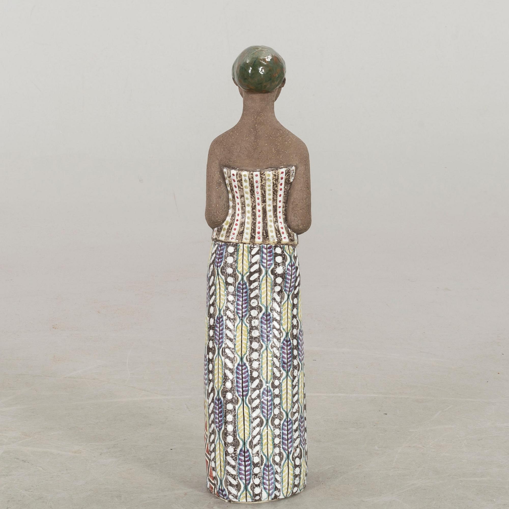 MARI SIMMULSON, a stoneware Upsala Ekeby signed figurine. 1953.