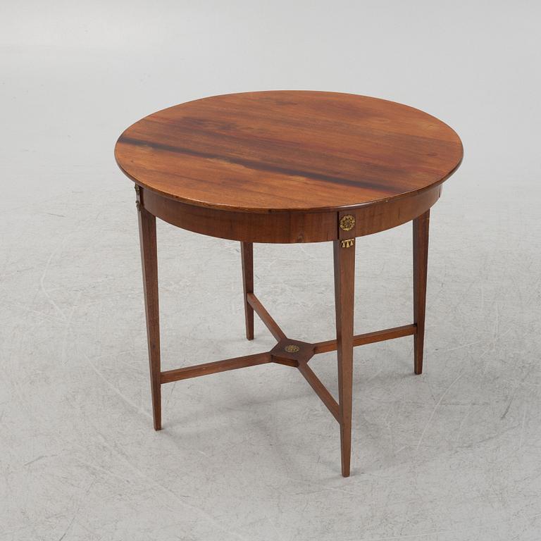 A mahogany veneered table, late 19th century.