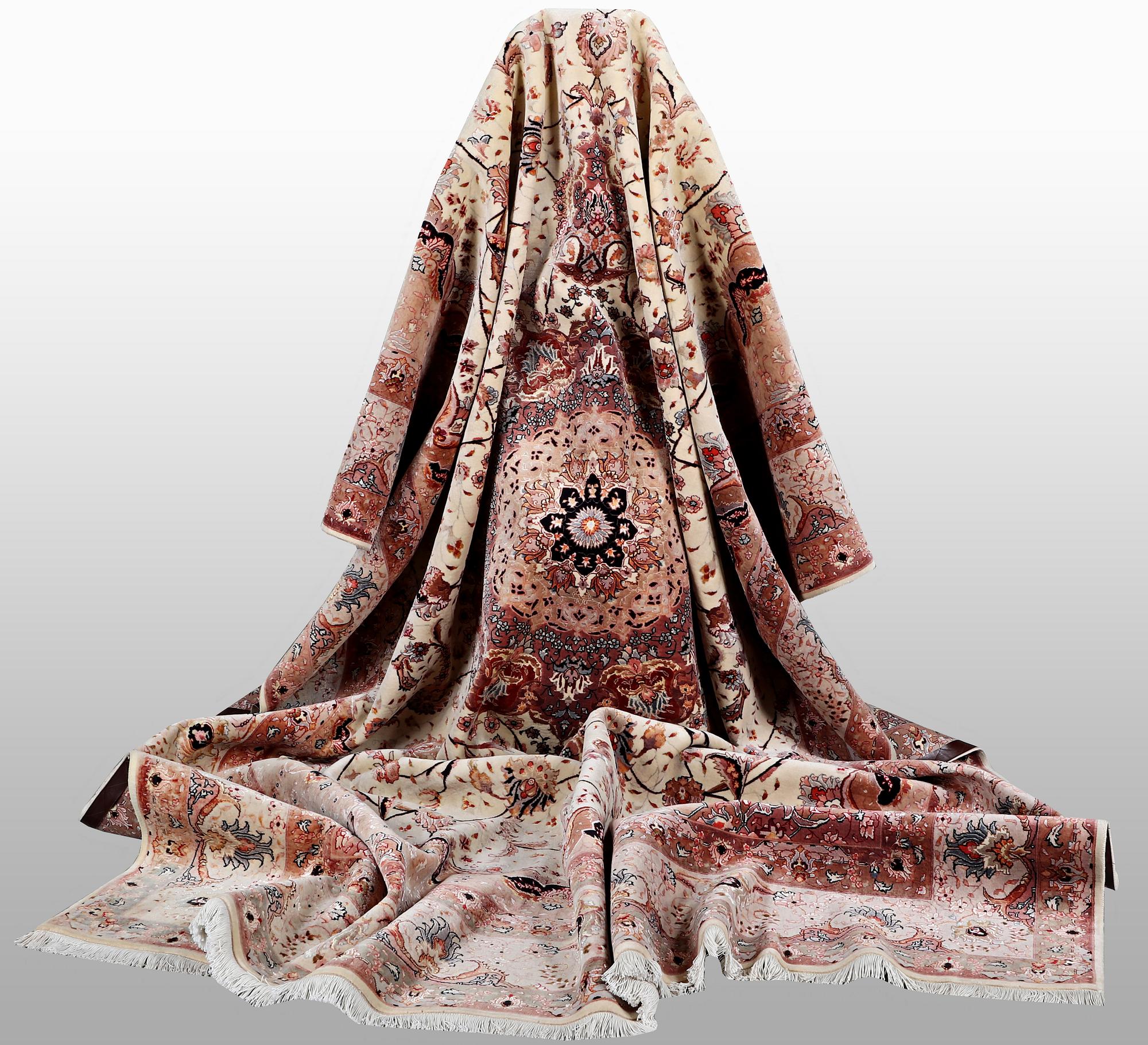 A carpet, Tabriz, part silk, 50 Raj, ca 340 x 253 cm.