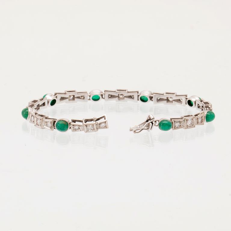 An 18K white gold bracelet set with emeralds and round brilliant-cut diamonds, Bertil Lundberg Goldsmith Stockholm 1961.