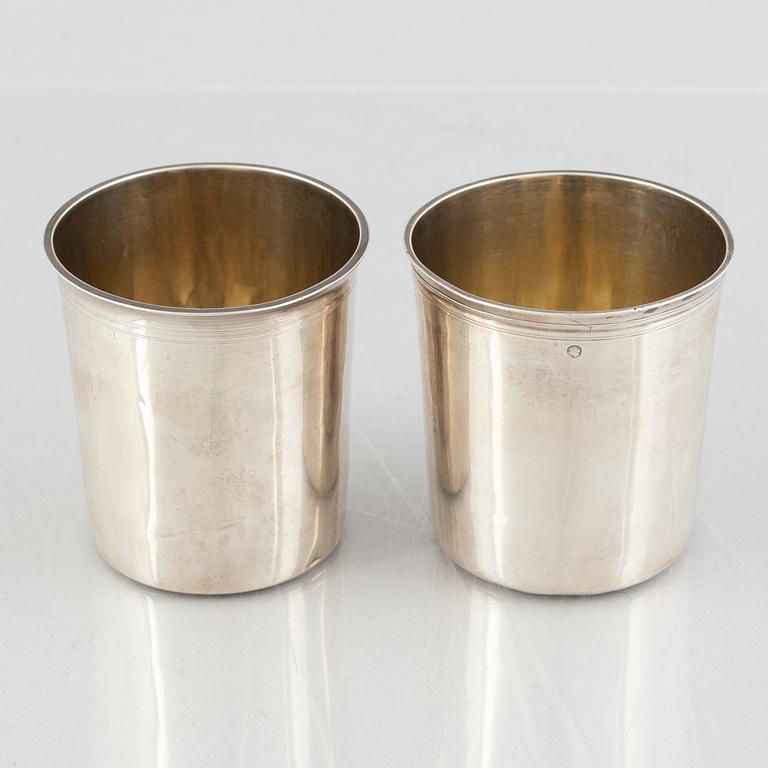 A set of four silver beakers, including Anders Rothman the Younger, Örebro, 1852-54.