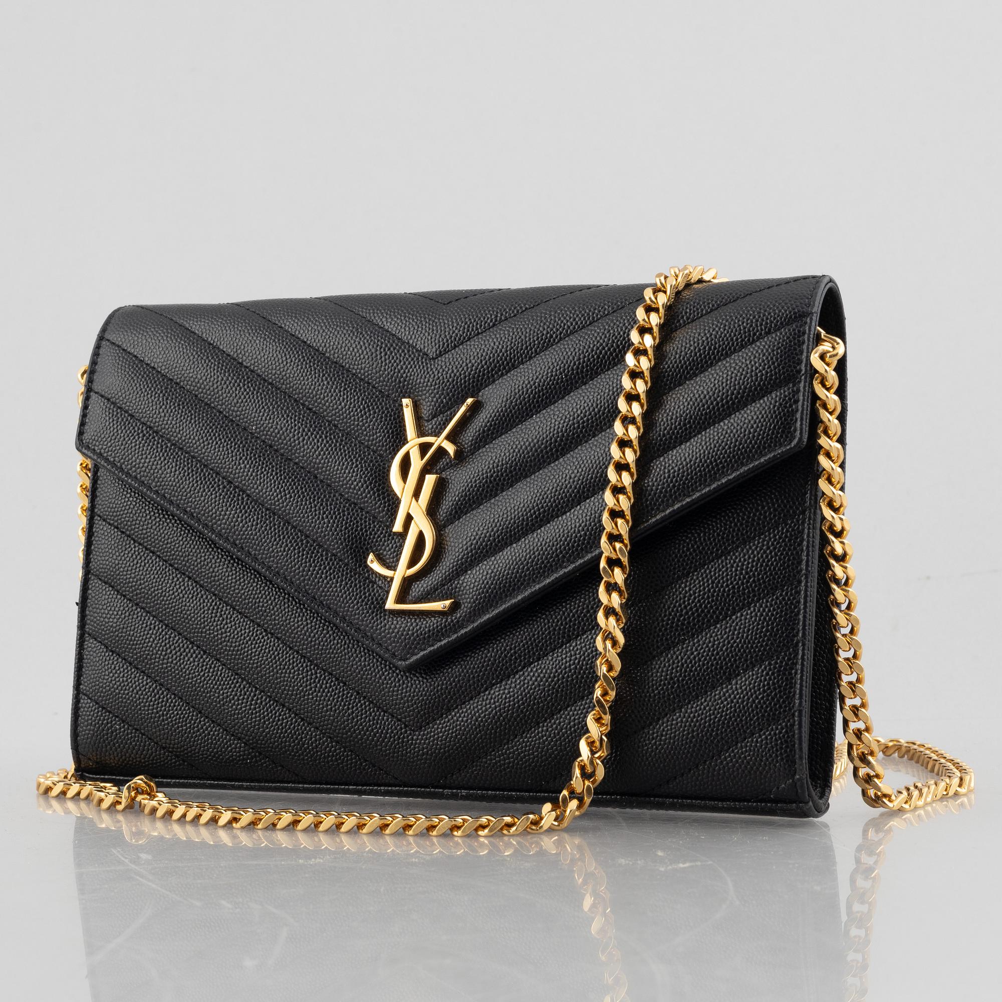 Yves Saint Laurent, a handbag/clutch.