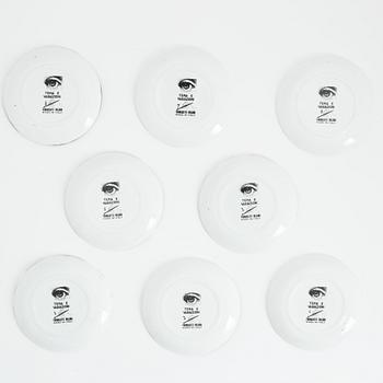 Fornasetti, eight porcelain 'Tema e Variazioni' coasters, Italy.